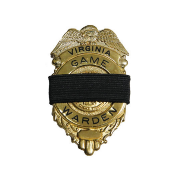 የወርቅ የቨርጂኒያ የጨዋታ ተቆጣጣሪ ባጅ።